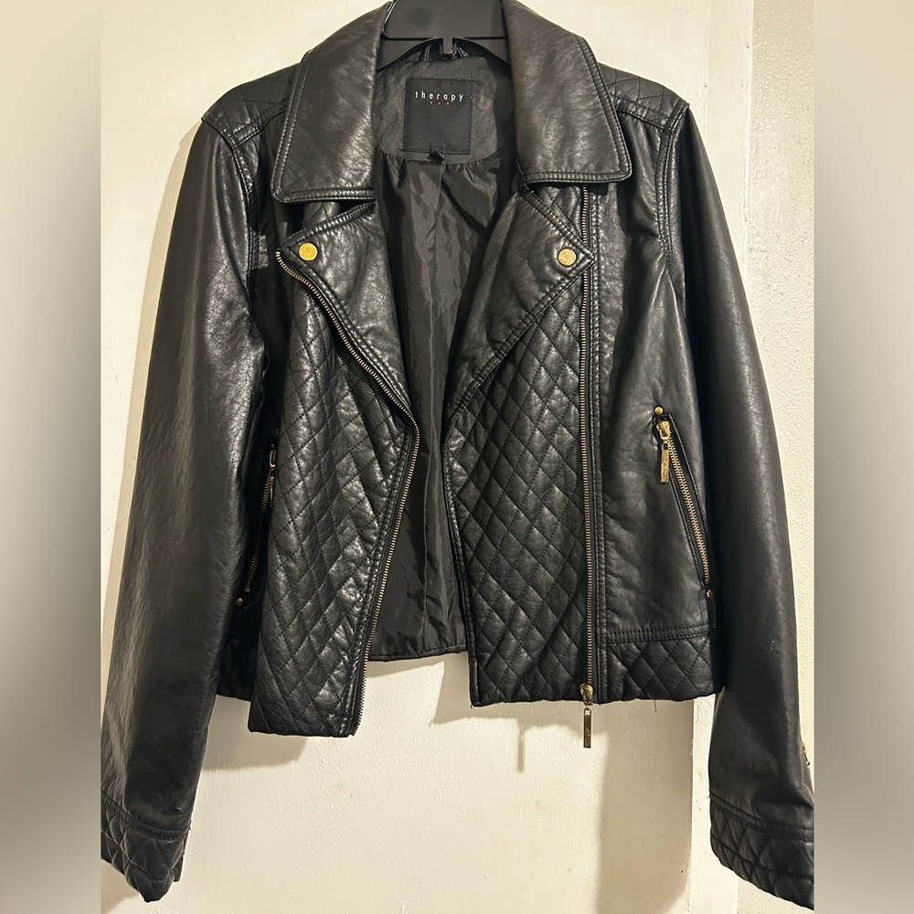 Women’s jacket by Therapy  in a size Large. Faux leather great for the Fall